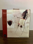 Bar Essentials Barware 5 Piece Wine Set. 1 Rack And Four 8oz. Glasses. Fixed Price $34.99.