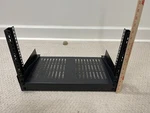 6u 2-post Open Frame 19" Desktop Rack Stand With 1u Shelf And Added Feet. Fixed Price $75.00.