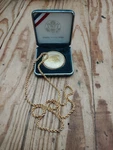 1994 Com Women In Military Proof Dollar With Gold Filled Bezeled Necklace Case. Fixed Price $110.00.